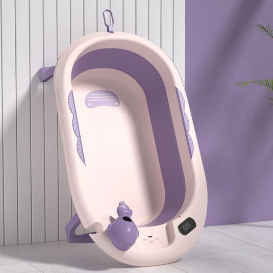 Cadita bebelusi pliabila cu pernuta UniqViBE®, termometru incorporat, cana pentru clatire tip jucarie, suport cap de dus si pentru sapun, 2 ratuste si casca protectie incluse, picioare antiderapante, design Ergonomic, Purple Royal