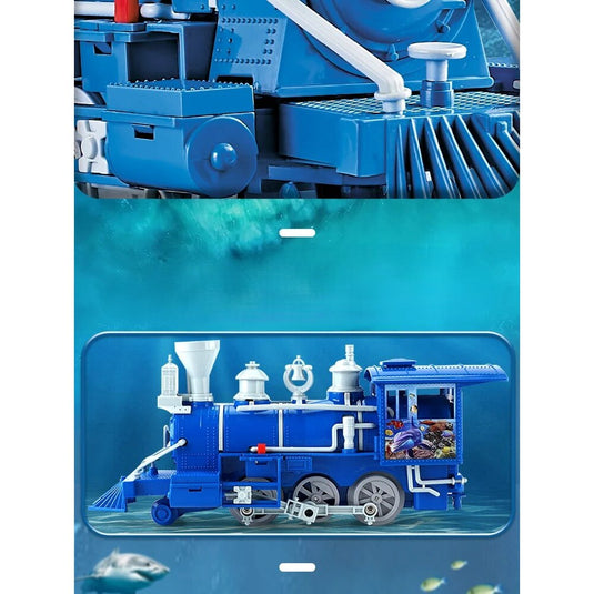 Trenulet Electric cu Aburi OceanExpress pentru Copii, Include Tren Electric cu Efecte Sonore, Lumini, Fum Real, 3 Vagoane, 16 Sine, Model Animalute Marine, Indiggo@, Blue Ocean, +3 Ani