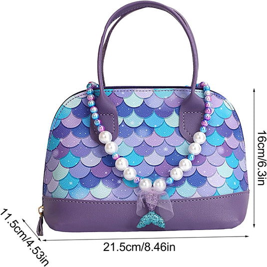 Geanta de Jucarie pentru Copii Mermaid Glam Bag Indiggo® – Set 15 Accesorii Frumusete cu Geanta, Bratara Fitness, Carnetel si Pix, Bani de Jucarie, Oglinda si Perie, Telefon, Ochelari, Ruj, Chei si Card, Joc de Rol Fashion, 3 Ani+, Purple Ocean